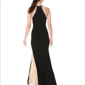 Xscape Long dress with halter neckline and illusion caviar beaded sides size 6
